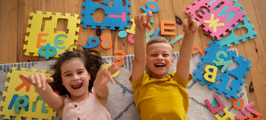 Happy Kids with Alphabet Letters Banner