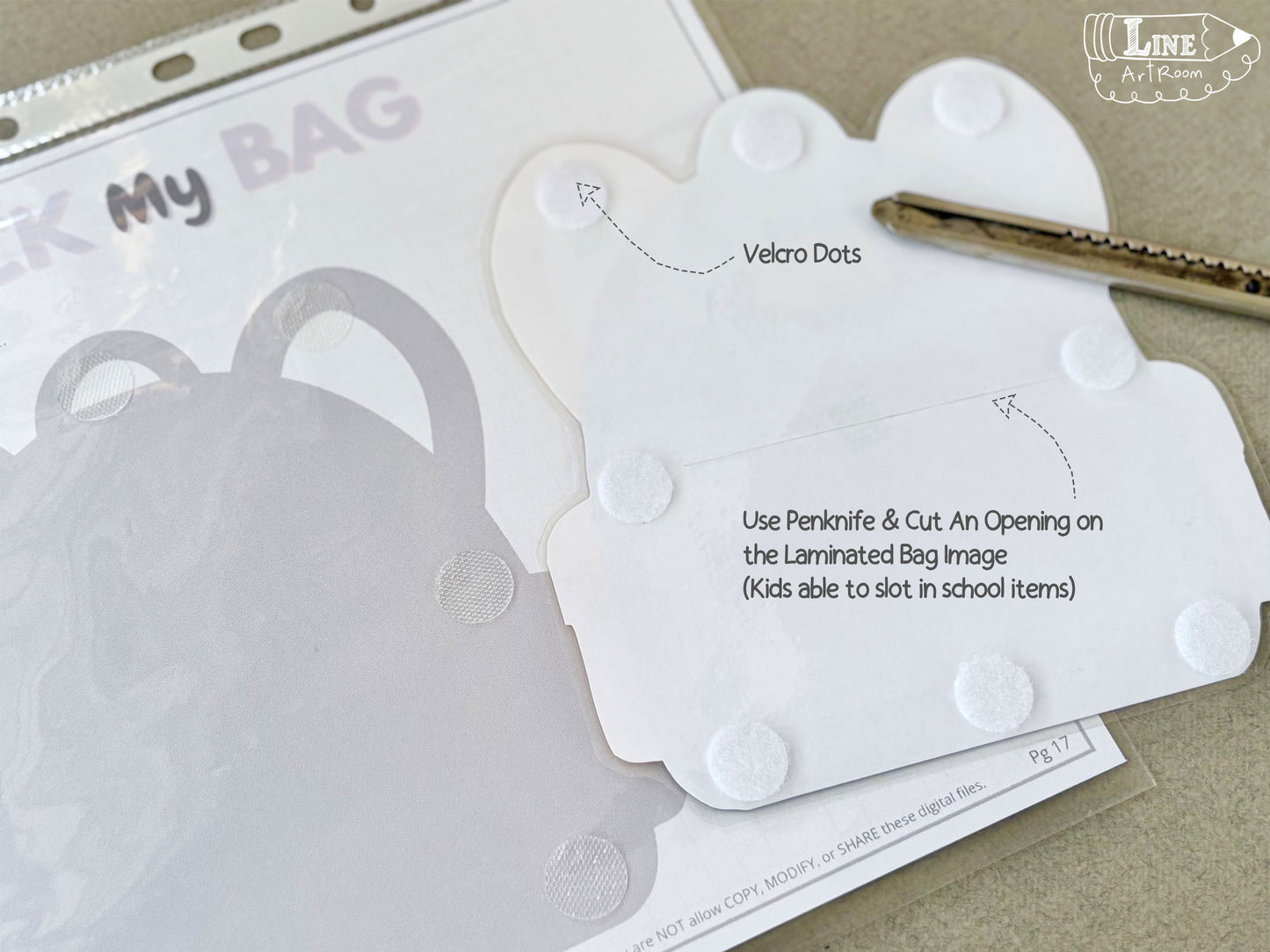 Showing details of white velcro dots on a laminated bag cut out with instructions